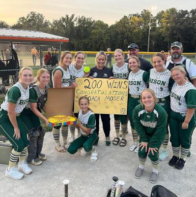 200 and Counting On Tuesday night the Bison softball team had plenty to celebrate as they won not just any game, but a game that ended up being a significant milestone. Bison head coach Neely Moser was joined by players and fellow coaches in celebration of her 200th coaching victory. (Courtesy Photo)