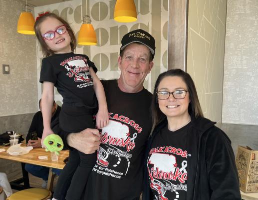 Continuing the Mission This week Central City was visited by some special individuals all hoping to raise awareness and funds for pediatric cancer. Jim Hickey (center) continues his promise of walking across Nebraska in honor of Paishence (left) a Cozad youth battling cancer, and joined by her mother Tara Meyer (right)