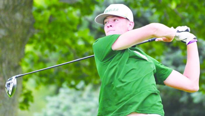 CENTRAL CITY’S KARTER NEGUS tees off on the seventeenth hole at last week’s NSAA Class C State Golf Championships. Negus finished the two-day tournament sitting tied for twenty-fourth place. Photos by Michael Happ