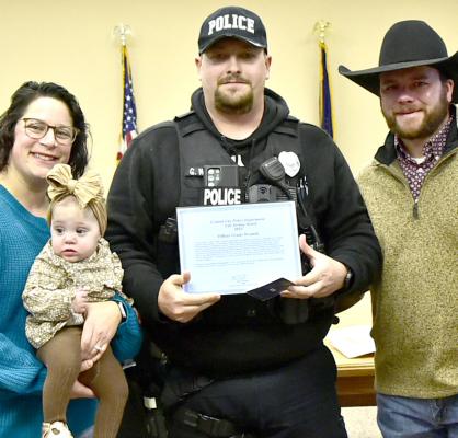 Grady Wranek with the Barton family