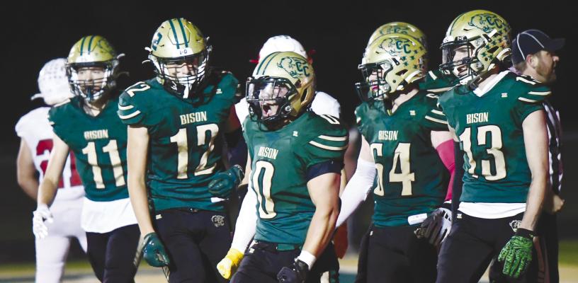 MEMBERS of the Bison football team celebrate a touchdown against Broken Bow earlier this season. Pictured above are Karter Negus, Luke McHargue, Corbin Kyes, Bryan Redmond, and Wyatt Dent. Photos by Jordan Coslor