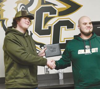 CENTRAL CITY HIGH SCHOOL graduate Jackson Uden- Roberts receives his diploma from Director of Opportunities Andrew Stolpe on Monday night. Photo by Jordan Coslor