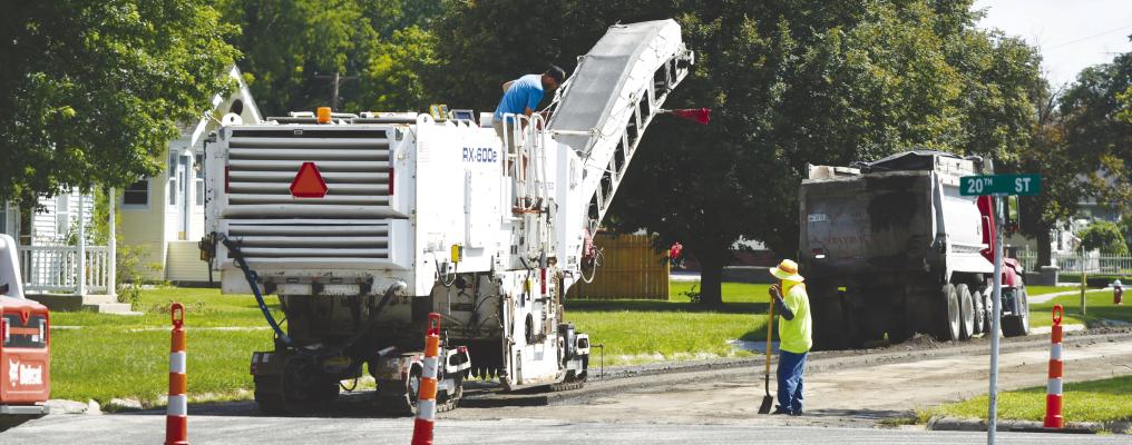 CREWS continued asphalt work on 16th Avenue in Central City this week. The project, which got underway last week when the road was closed, included multiple blocks of work, including the portion that runs on the west side of the Merrick County Courthouse. Photo by Jordan Coslor