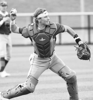 QUINN JENSEN fields a bunt and throws out a GACC-WPM runner at first base in Central City/Centura’s game with the Patriots.