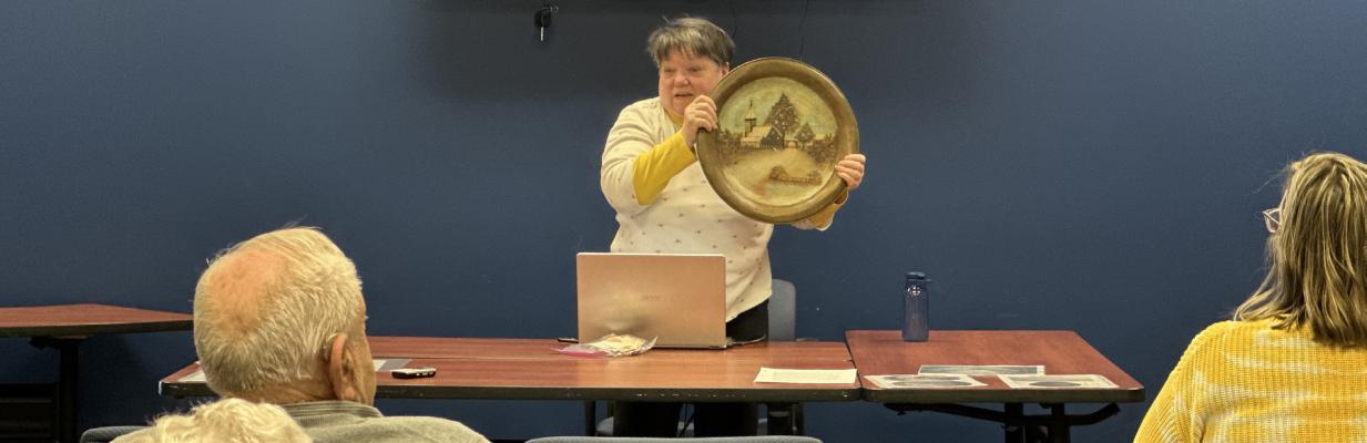 Fact or Fiction? Local expert Luddene Perry holds up the Pewter Turkey Platter that was said to have been brought from England to America by Jemima Woodbridge who with 99 other Puritans crossed the ocean in the Mayflower in the year 1620. Perry showed no evidence to support the claim.