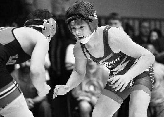 MAKAYO CONFER of High Plains Community takes on Phillip Totkemeier of Loomis in the consolation semifinals of the Dom Reicks Invite in Ravenna. Photo by Michael Happ