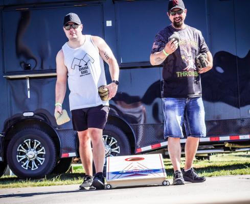 Friendly Competition With smiles on their faces, Josh Salinas (left) and Mike Fruit (right) of Central City, are two of the local faces that can often be found at Lone Tree Throwers cornhole events. The organization continues to grow and welcomes the community to join them on Sunday’s at the Central City Volunteer Fire Department.