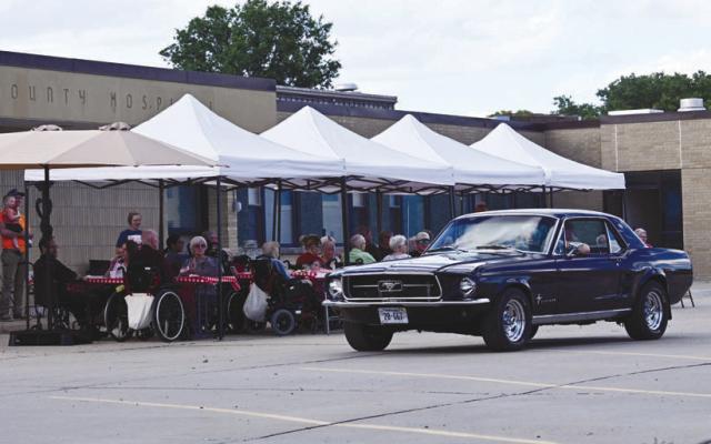 RESIDENTS AT LITZENBERG LONG-TERM CARE had the opportunity to enjoy a variety of cars during the facility’s annual Father’s Day barbecue after a drive-by car show was organized last week. Photo by Michael Happ