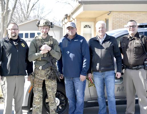 The Merrick County Sheriff’s Department is all geared up and ready to help with the Central Nebraska Special Response Team thanks to a donation from Strobel Manufacturing Inc. Left to right: Sheriff John Westman, SRT member Deputy Danial Parker, Shane Strobel, Larry Myers and SGT Jake Bauer.
