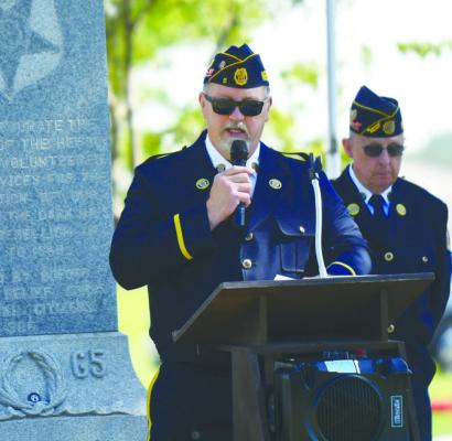 MEMORIAL DAY was observed at the Central City Cemetery outside of Central City on Monday, with services being conducted by the Central City American Legion Post 6. Above, Miles McGinnis delivered the Memorial Day address during the ceremony. Photo by Jordan Coslor