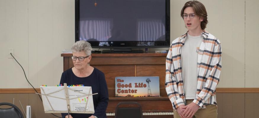 Giving Back With Gusto This past Monday, those who gathered for lunch at the Senior Center in Central City were in for a treat. A preview of what is to come in this year’s musical, presented by cast member Fyn Fasbender who performed three songs while Suzanne Philippi played the piano.