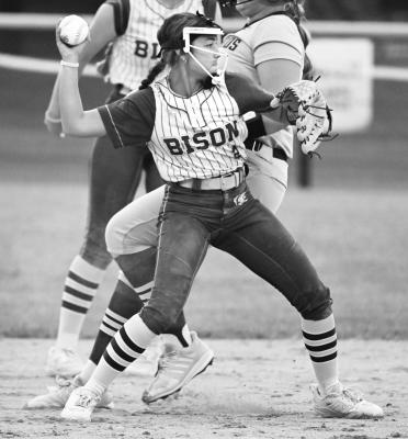 DEJA FOTHERGILL gets the force out at second base and attempts to turn a double play.