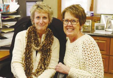 PINNACLE BANK’S Sharon Tibbetts (right) and Kelly Wichmann (left) are pictured in the bank last week. Tibbetts will retire at the end of the month. Photo by Michael Rother