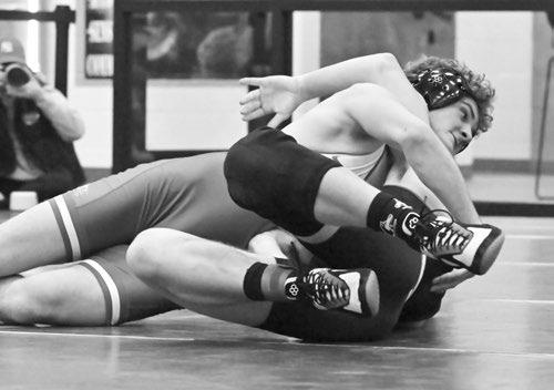 PARKER SANTIN attempts to pin Aurora’s Owen Jacobsen in last week’s Central City Wrestling Invite. Photo by Michael Happ