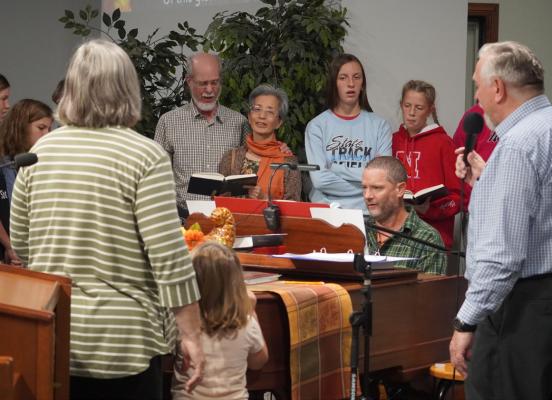 Everybody Sing Along Steve Swanson taps the keys on his piano as members of Grace Bible Fellowship sing along to the hymns and worship songs he played.