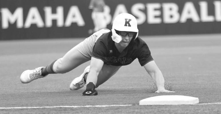 LUKE VAKINER dives into third base in Central City/Centura’s game with Mount Michael last Monday evening. Vakiner drew two walks and scored a run in the Kernels’ 6-5 loss to the Knights.