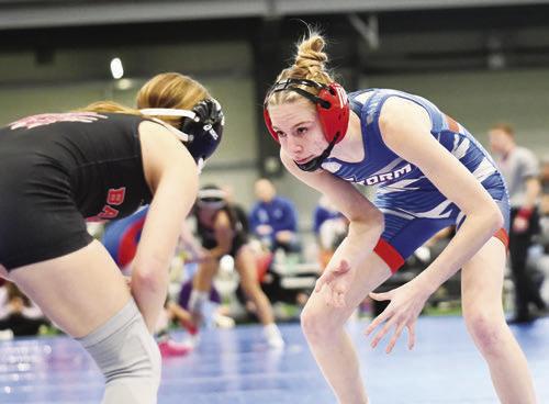 BAILEY GRESS faces off with Danika Janssen in the second championship round of last week’s Norm Manstedt Invite in Columbus. Photo by Jordan Coslor