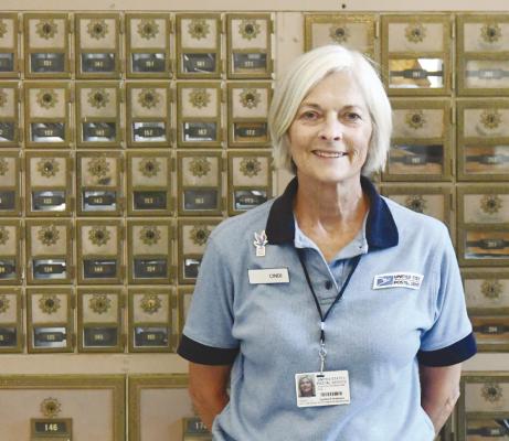 CINDI ANDERSON will end her forty-one-year career with the United States Postal Service next Friday. Photo by Jordan Coslor