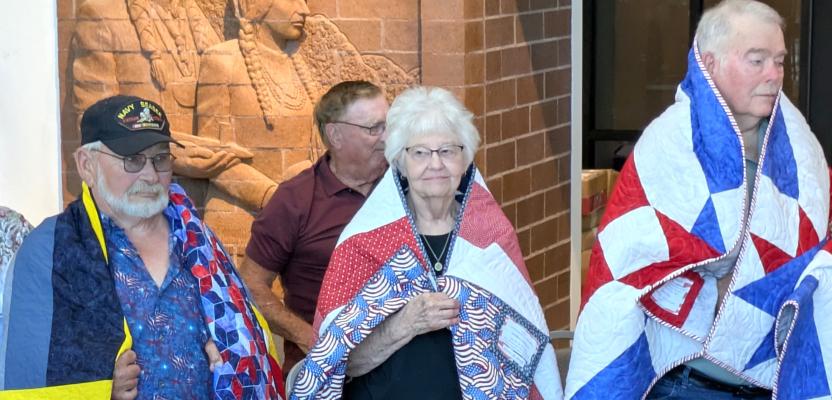 Receiving a Quilt of Valor were Bob Cline, Sandy Lindgreen and James M. Kirlin. The trio of well-deserving veterans were honored this past Saturday during a special ceremony. (R-N Photo by Grant Brooks)