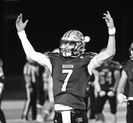 PARKER ZIKMUND celebrates after securing the win over Broken Bow. During the Bison’s 34-20 win over the Indians, Zikmund broke Central City High School’s all-time career passing touchdowns record. Photos by Jordan Coslor