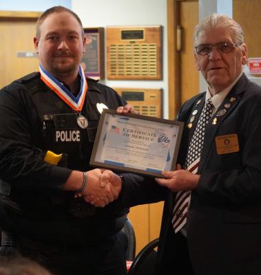 Earlier this year we brought you the story of Central City Police Department officer Grady Wranek (left) whose quick thinking and heroic actions saved the life of a Central City youth. Officer Wranek was fittingly honored by the Grand Island Elks Lodge 604 this past Saturday where William Koller presented him with a special medal and certificate. (R-N Photo and Story by Jacob Kennedy)