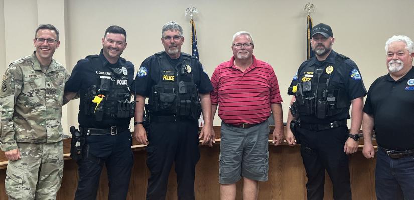 Team America At the end of the day we are all on team America and Monday night Police Chief Mark Dreher and Sergeant Todd Church were honored with a Patriot Award. Republican-Nonpareil Photos by Chelsey Havenridge
