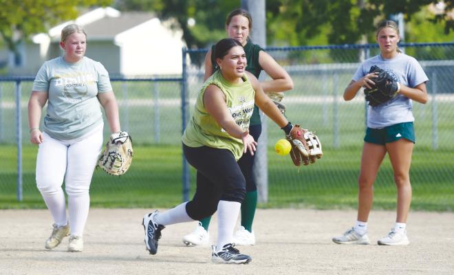 FRESHMAN KELEIGH GONZALEZ participates in a fielding drill on Monday afternoon during the Central City softball team’s first practice of the week. The team’s first game is scheduled for Thursday in Central City. Photos by Jordan Coslor
