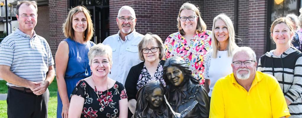 Left to right: City Administrator Chris Anderson, CCPL Board Member Karen Benner, Library Director Sara Lee, CCPL Board Member Ed Dexter, CCPL Board Member Donna Jorgensen, Library Assistant Jamie Wright, CCPL Board Member Jeanne Grosshans, CC Mayor Tim Bolling, and CCPL Board Member Amy Buhlke.