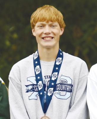 NEBRASKA CHRISTIAN senior Jacob Swanson earned a fourth-place medal at last Friday’s NSAA Class D State Cross Country Championships in Kearney. Swanson completed the course at the Kearney Country Club in 16:35.2 for the hardware, helping lead his team to a fifthplace finish with fifty-three points. Photo by Jordan Coslor