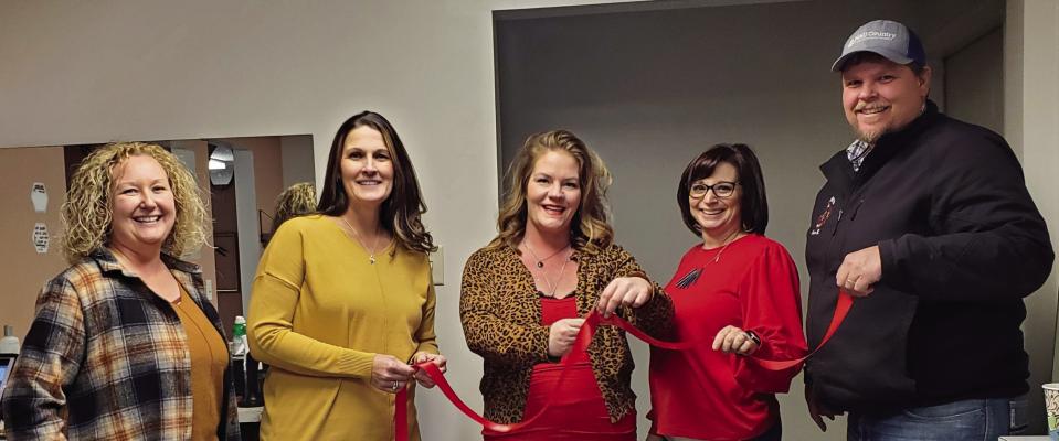 Welcome to Town The red carpet and red ribbon were rolled out for Luxe on Green Salon in Clarks as the salon joined the Clarks business community. Left to right are, Barbee Sweet, Sheri Wrubel, Mandee Hilmer (Owner) Kari Podliska and Kevin Urkoski who joined for the celebration.