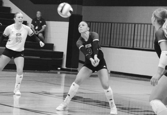 AVA CALL returns a serve last Thursday night during Central City’s victory over Ravenna. Photos by Monte Steele