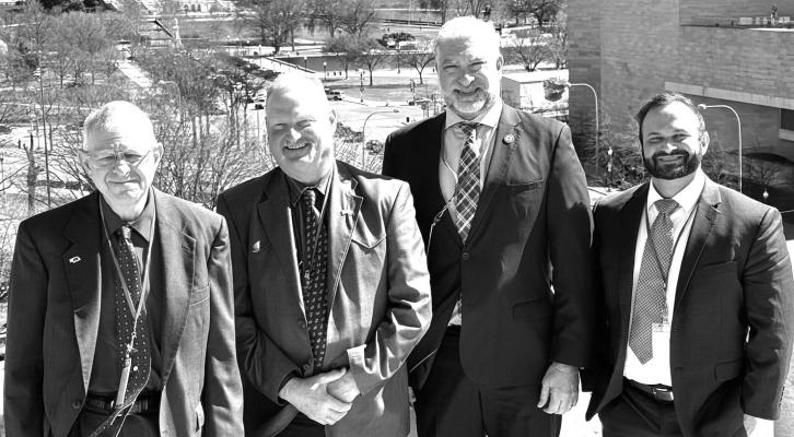 Pictured L-R: David Grimes, NEFB Board, Dennis Beethe, NEFB Board, Mark McHargue, NEFB President, Brady Revels, Douglas County member.