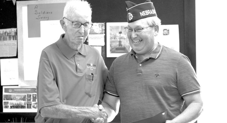 A True Living Legend When you hear, “They sure don’t make them like they used to” they could very well be talking about Shorty Hahn. The 95-year-old WWII veteran was honored last Friday at the American Legion Post #6. Hahn received a Quilt of Valor and recognition from Tom Reimers who received a joke and a handshake.