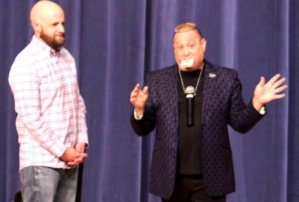 Helping Hand The Merrick Arts Council was back again with another exciting show this Sunday at the Performing Arts Center as magician Michael DeSchalit (right) entertained the crowd with a mixture of magic and humor. The day even brought guest appearences from local faces like that of Brian Kroksh (left) who got on stage.
