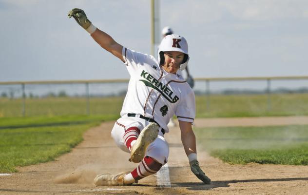 QUINN JENSEN slides safely into home plate for Central City/Centura’s first run of the game against Wayne. Jensen finished the game with two hits, including a triple. Photos by Jordan Coslor