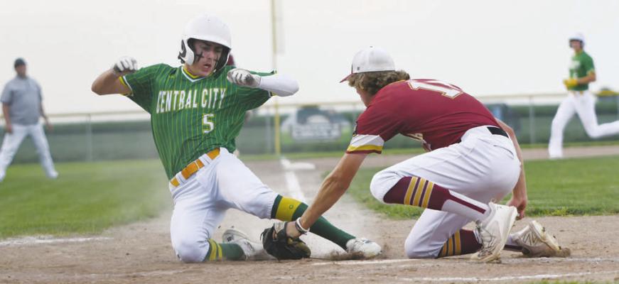 LUKE MCHARGUE attempts to slide past the tag from Centura’s Barrett Fries early in the Battle of the Kernels last Thursday in Central City. Photos by Jordan Coslor