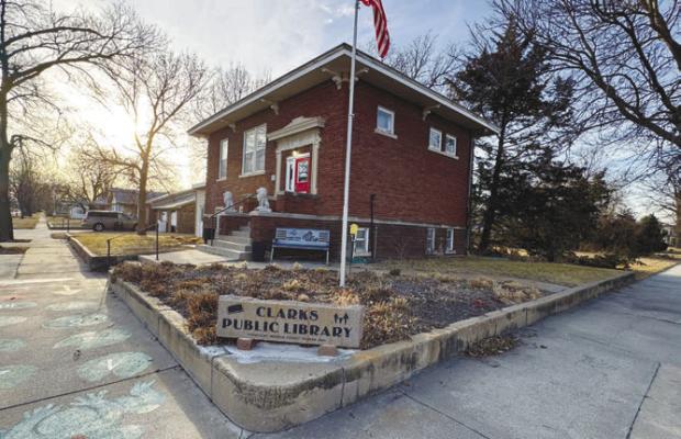 THE CLARKS PUBLIC LIBRARY is one of 750 Carnegie-built libraries still functioning as a library today. The library recently received a $10,000 gift from the Carnegie Foundation as a part of the organization’s twenty-million-dollar giving initiative. Photo by Michael Happ