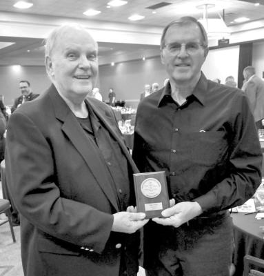 Mike Wells, General Manager of Twin Loups Irrigation and Reclamation District was presented the Nebraska Headgate Award by Lee Orton at the 2023 Four States Irrigation Council meeting held in Fort Collins, CO.