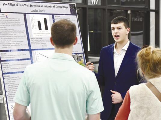CENTRAL CITY’S LANDEN PURVIS was one of the many students who presented their research on Monday night during the Central City Science Fair held in the high school commons. Photos by Jordan Coslor