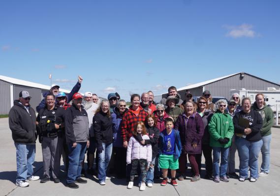 Volunteers from across our community gather the first Saturday of each month to help provide food boxes to those in need at the drive through food bank.