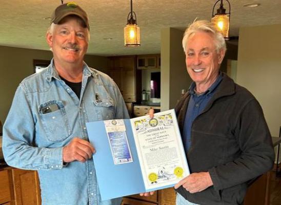 Congratulations Admiral Santin It is a busy time for local farmer Mike Santin, but he spared a few minutes to meet with his neighbor as he received an Admiralship honor from the State of Nebraska. The award was presented by Sen. Loren Lippincott who also happens to be Santin’s neighbor and friend in northern Merrick County.