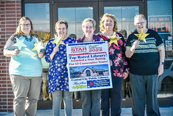 Shining Bright It was another five-star year for the staff at the Central City Public Library as they celebrate their 15th year in a row with a star awarded by the Library Journal naming them one of the top rated libraries in the country. Left to right: Jamie Wright, Sally Bankson, Sara Lee, Lori Hood, and Adele Maynard.