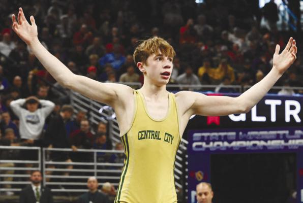 CENTRAL CITY’S ACE SCHWEITZER celebrates after winning the Class C state title at 106 pounds on Saturday afternoon at the CHI Health Center in Omaha. Schweitzer finished the year with a 52-0 record. Photos by Michael Happ