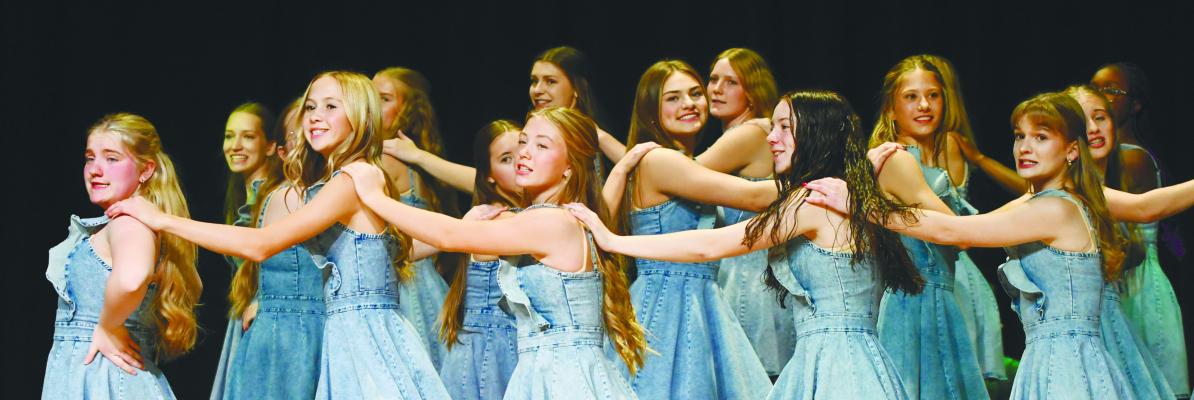 MEMBERS of the Central City High School Show Choir performed as a part of the Merry and Bright Concert at the Performing Arts Center in Central City on Monday night. A large crowd turned out for the event, which featured a variety of performances. Photo by Jordan Coslor