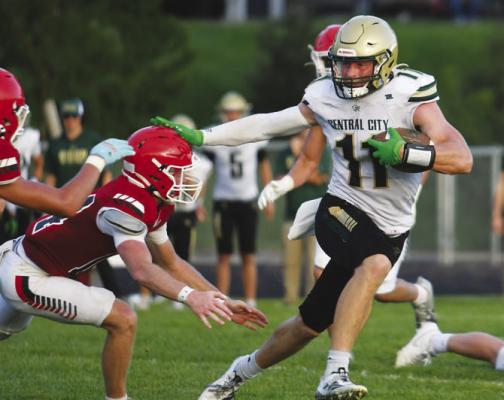 TURNER HANKE shakes off an Ord tackler on the way to a forty-three-yard touchdown reception. Hanke led Central City with fifty-three receiving yards against the Chanticleers. Photos by Jordan Coslor