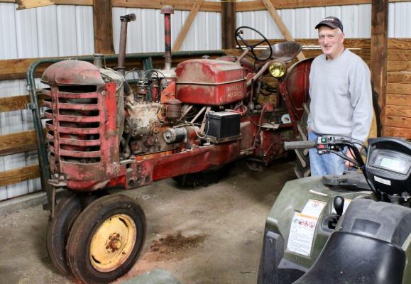 Family Traditions Stan and his dad’s Massey Harris 30 which has been in the family since 1953