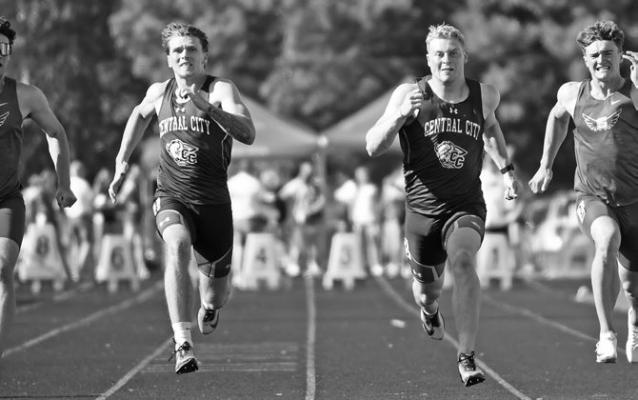 WYATT DENT AND TURNER HANKE sprint to the finish line in the 100-meter dash at the B-5 District Meet in Central City. Dent and Hanke secured first and second place finishes in the race to qualify for the state championships. Photos by Jordan Coslor