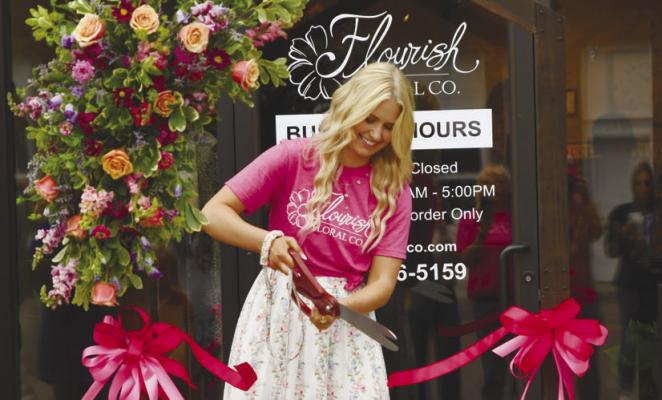 FALLON WELLS cut the ribbon on her new business in downtown Central City—Flourish Floral Co.—during a special ribbon cutting and open house event on Friday, July 3rd. Photos by Jordan Coslor
