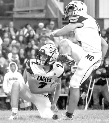 Team Effort The Nebraska Christian Eagles hit a setback last week with a loss at Wisner-Pilger but still set in good shape at 2-1 thanks to solid team play from players like Oliver Herman (2) and Micah Perdew (5).