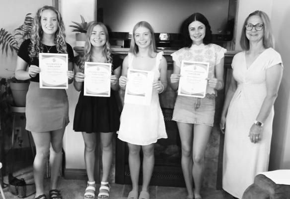 SCHOLARSHIP RECIPIENTS that were recently recognized included Rylee Hoffman, Hailey Weller, Emma Brandes, Reagan Fousek, and Scholarship Committee Chairman Karen Benner. Courtesy Photo